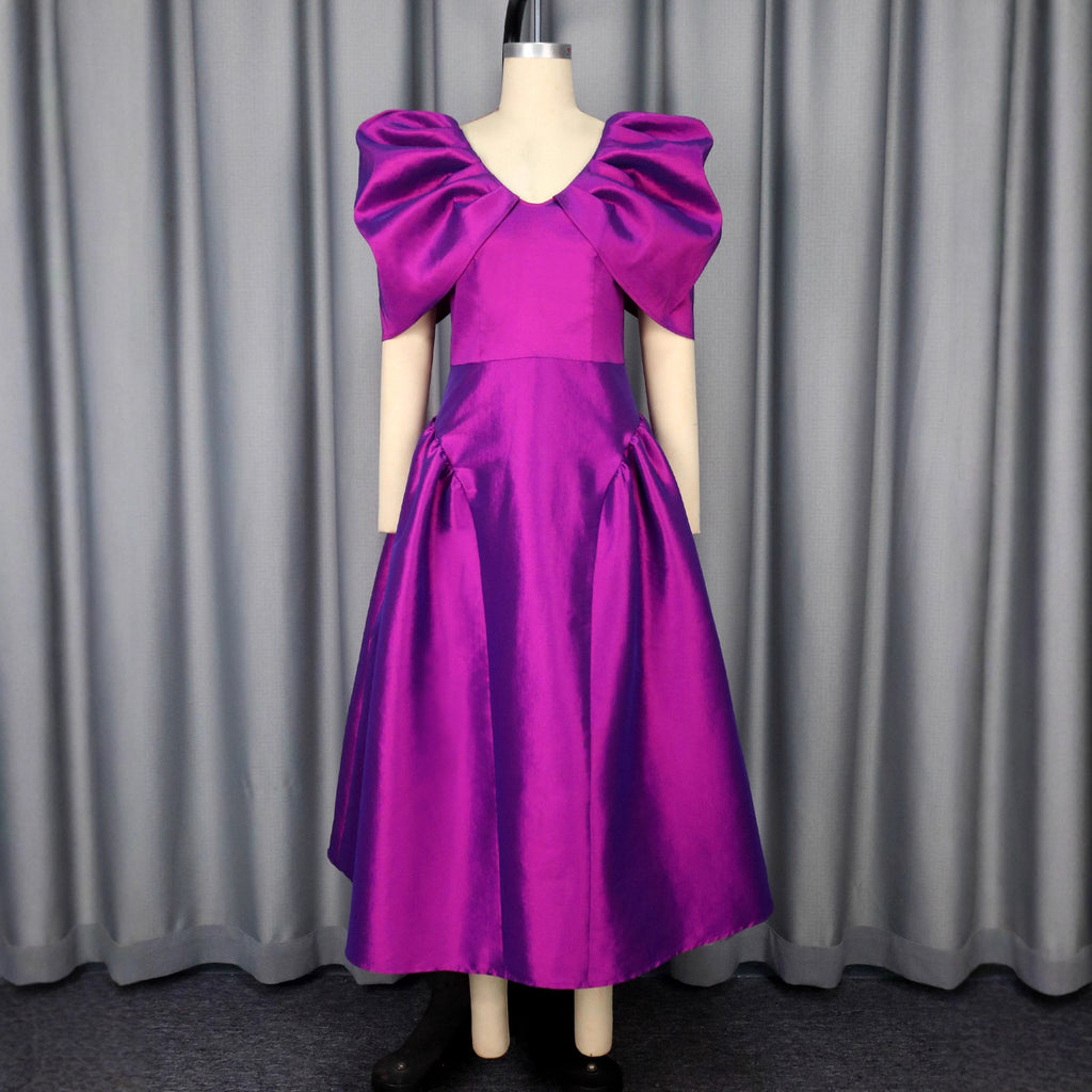 Robe de soirée à manches de puff Une robe de banquet plissée à l'ourlet