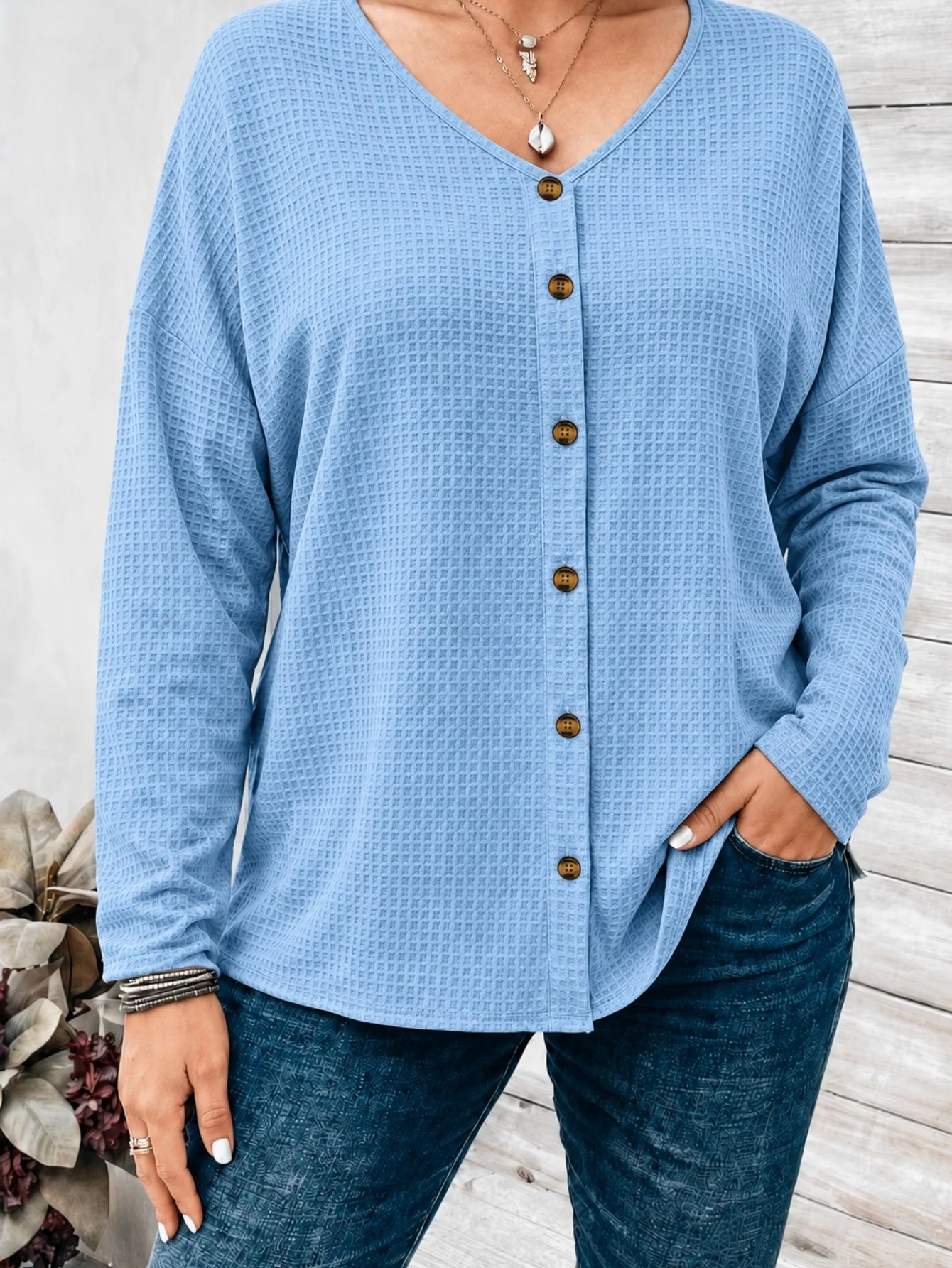 Blouse féminine avec épaules longues
