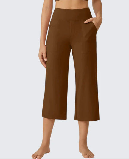 Les femmes haute taille emportent droit pantalons de yoga occasionnels avec des poches