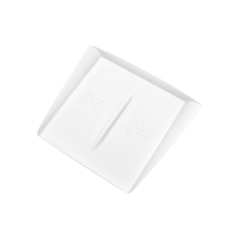 Pad en silicone pour recharger le téléphone sans fil sur la console du centre des voitures