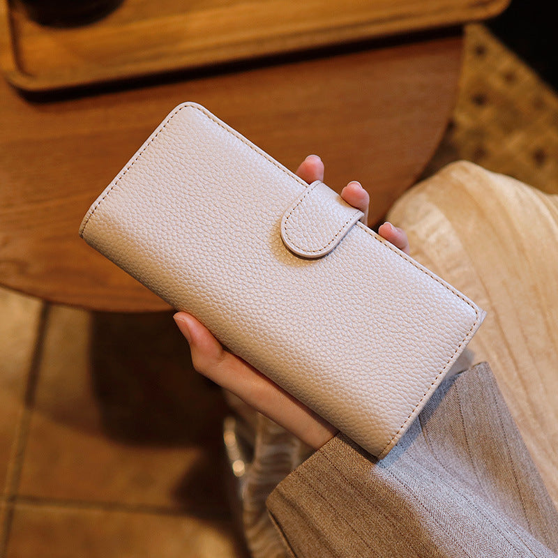 Portefeuille long pour femmes fabriqué à partir de cowhide plein grain