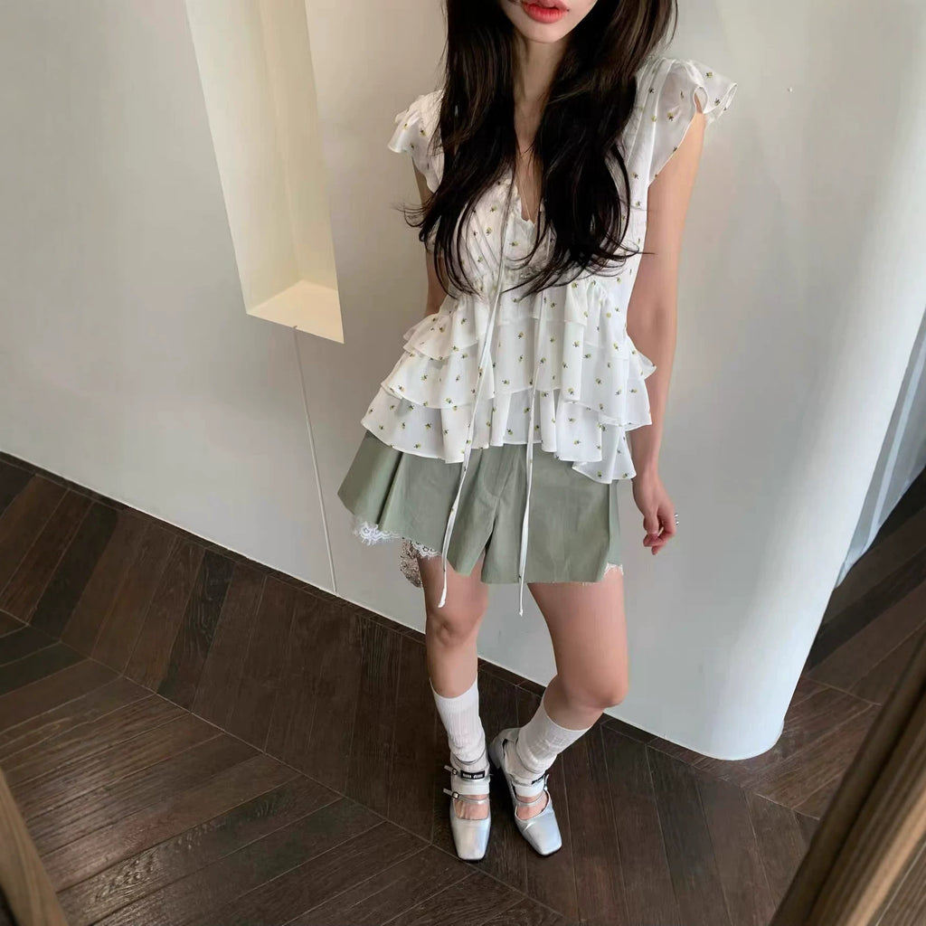 Veste de blouse plissée avec rubans
