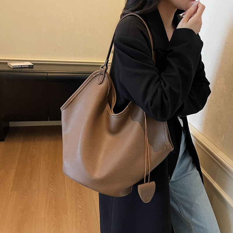 Vieux sac de seau de lit pour femmes