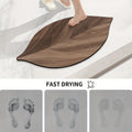 Tapis de sol absorbant de salle de bains à grain de bois à motifs de feuilles
