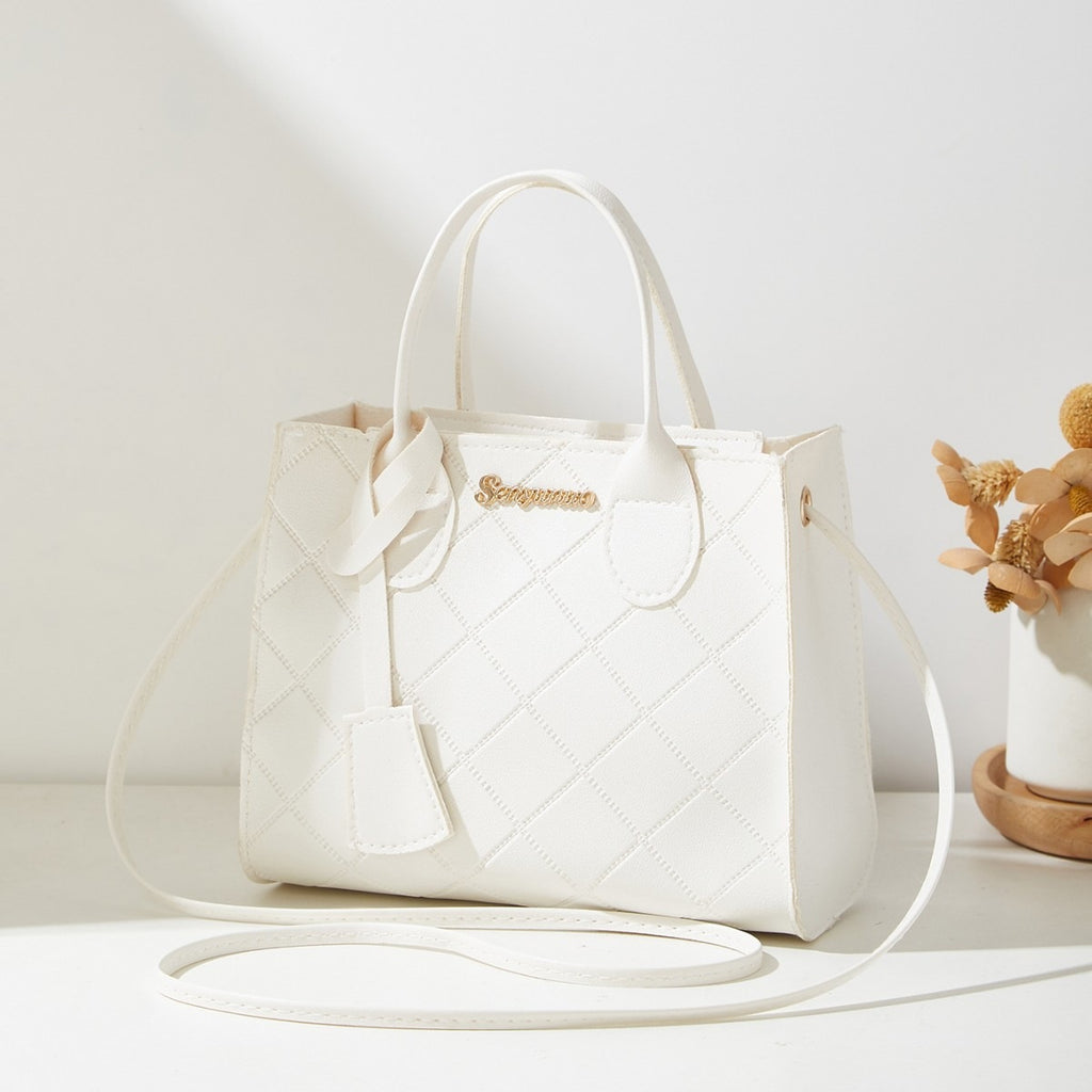 Sac à bandoulière unique matelassé en diamant