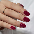 Les ongles artificiels en forme d'amandes longs de couleur solide pour femmes