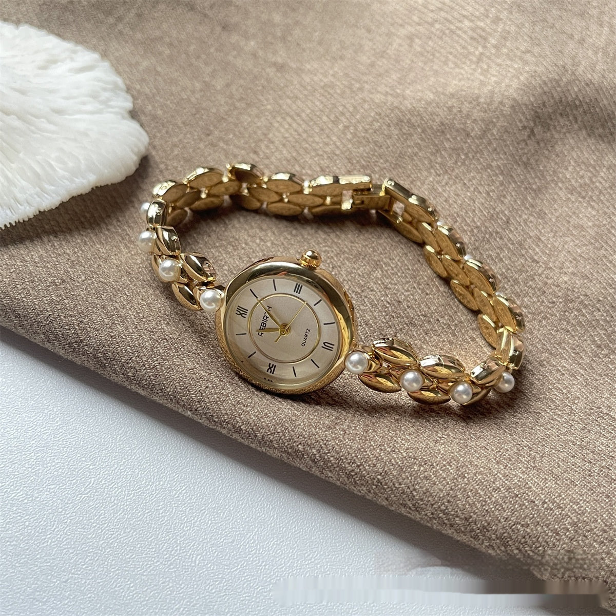 Montre en chaîne de perles romaines pour les femmes