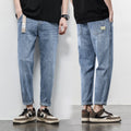 Jeans Denim minces Hommes perdre la jambe droite