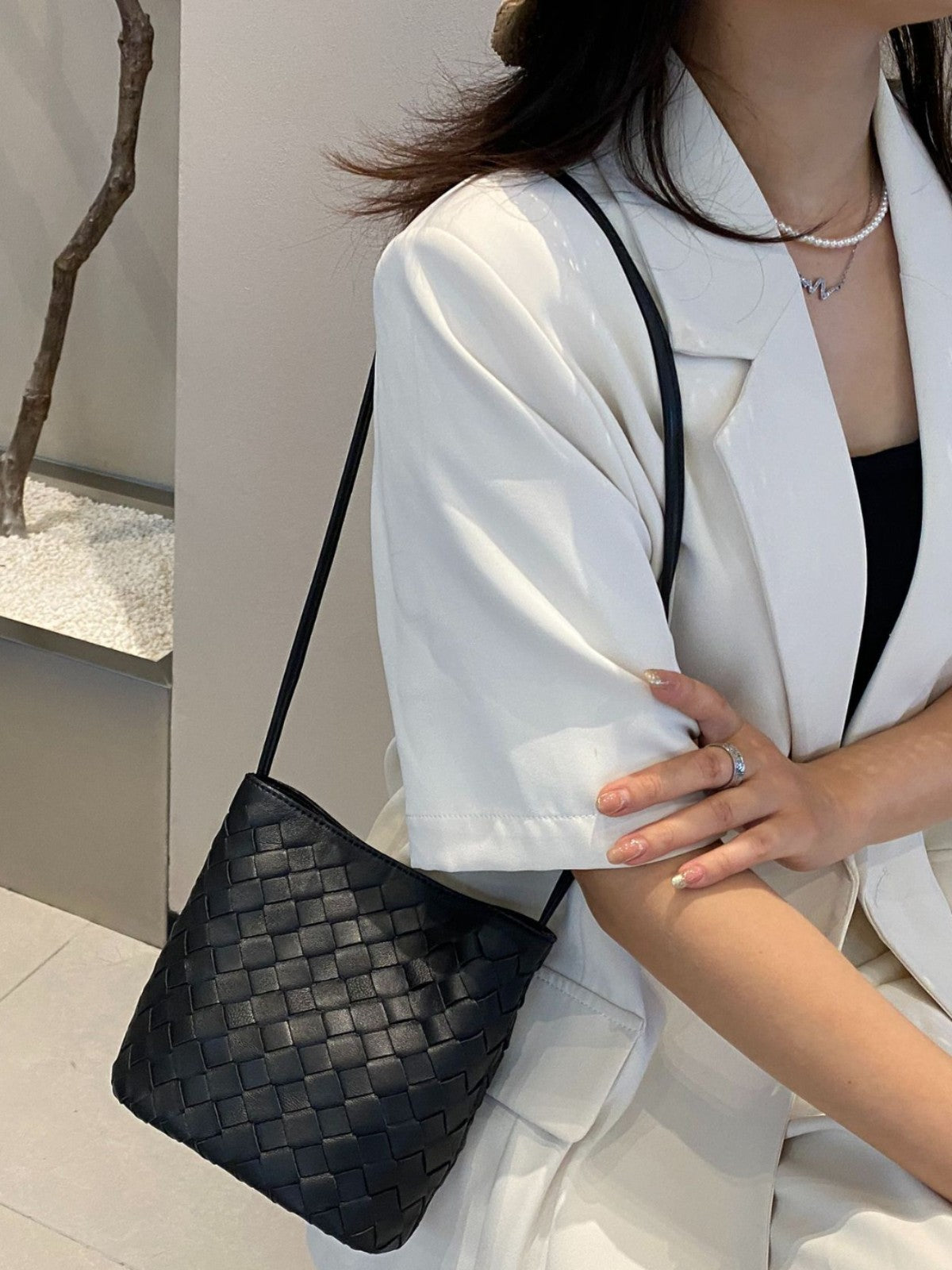 Cuir véritable tissé petit sac