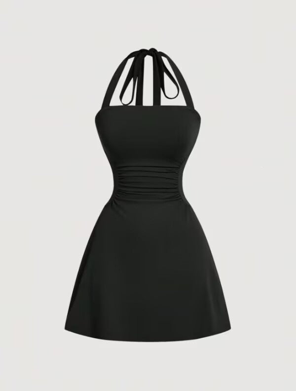 Robe de sangle spaghetti sans dos en tissu plissé couleur solide pour femme
