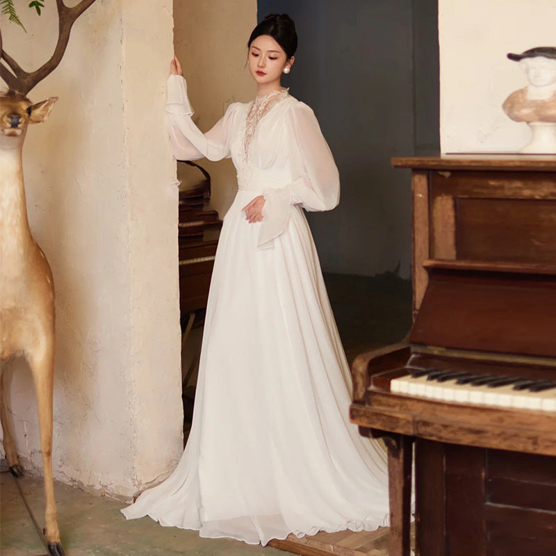 Robe de mariée vintage en dentelle de style français avec manches de puff