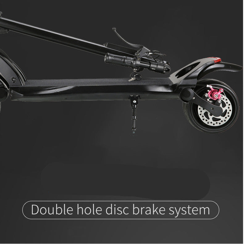 Scooter pliant double disque avec pneus larges