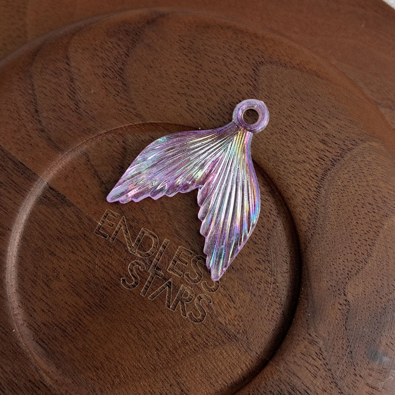 Perles de queue enduites d'acrylique