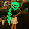 Ensemble de masque de squelette de dinosaure avec peluche