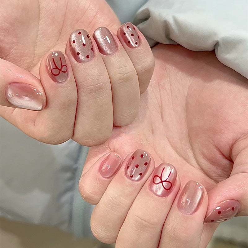 Série d'oeil de chat porter des ongles d'été