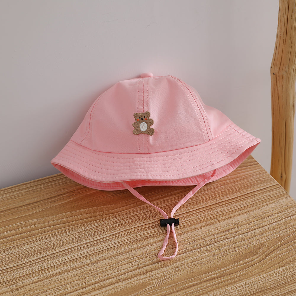 Chapeau de soleil d'été léger de couleur candy pour enfants avec cordon de serrage