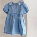 Robe de denim brodée à manches courtes