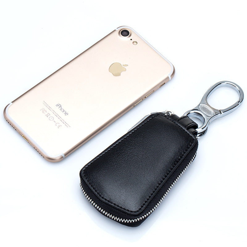 Boîtier en cuir avec ceinture zippée