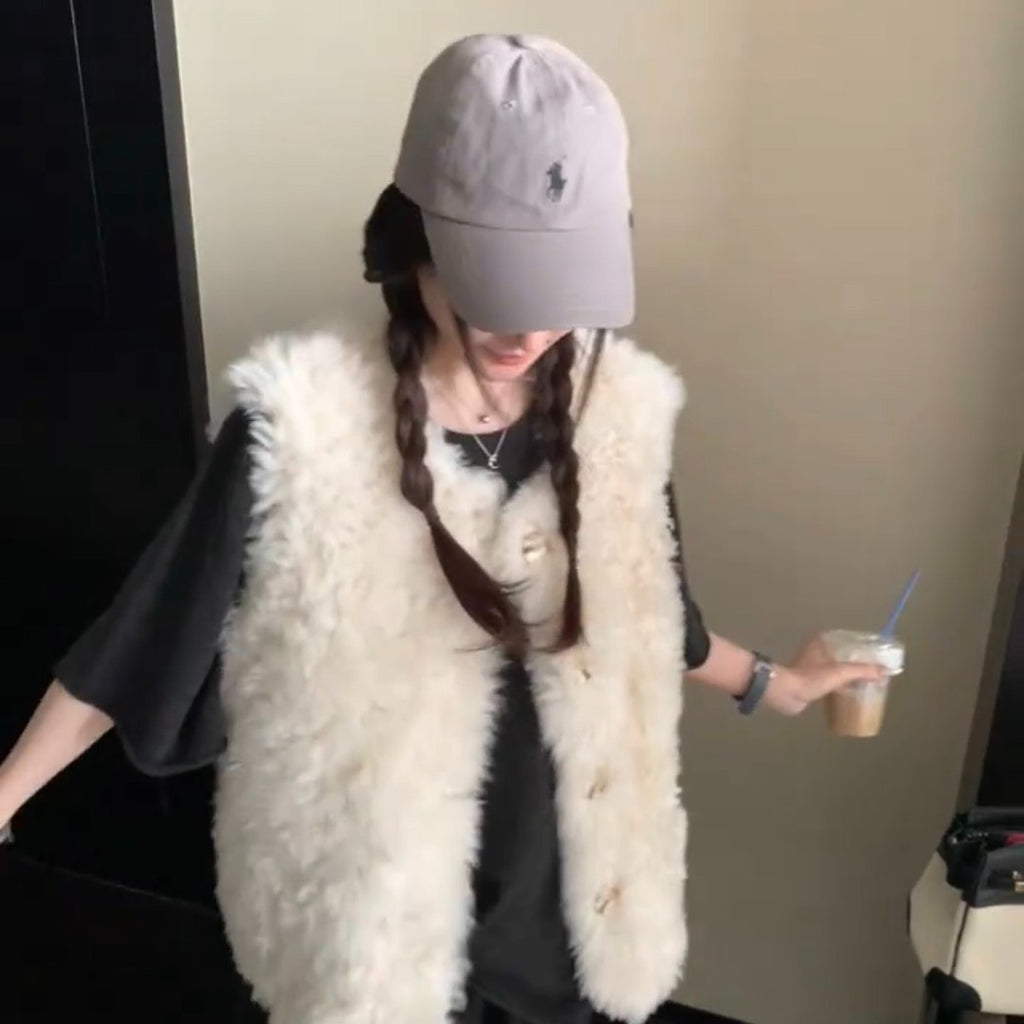 Veste en cuir et en fourrure mi-longueur