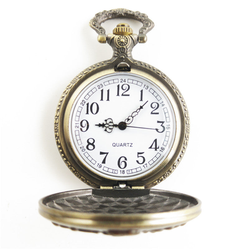 Vieille montre de poche fléchée aux gros oiseaux
