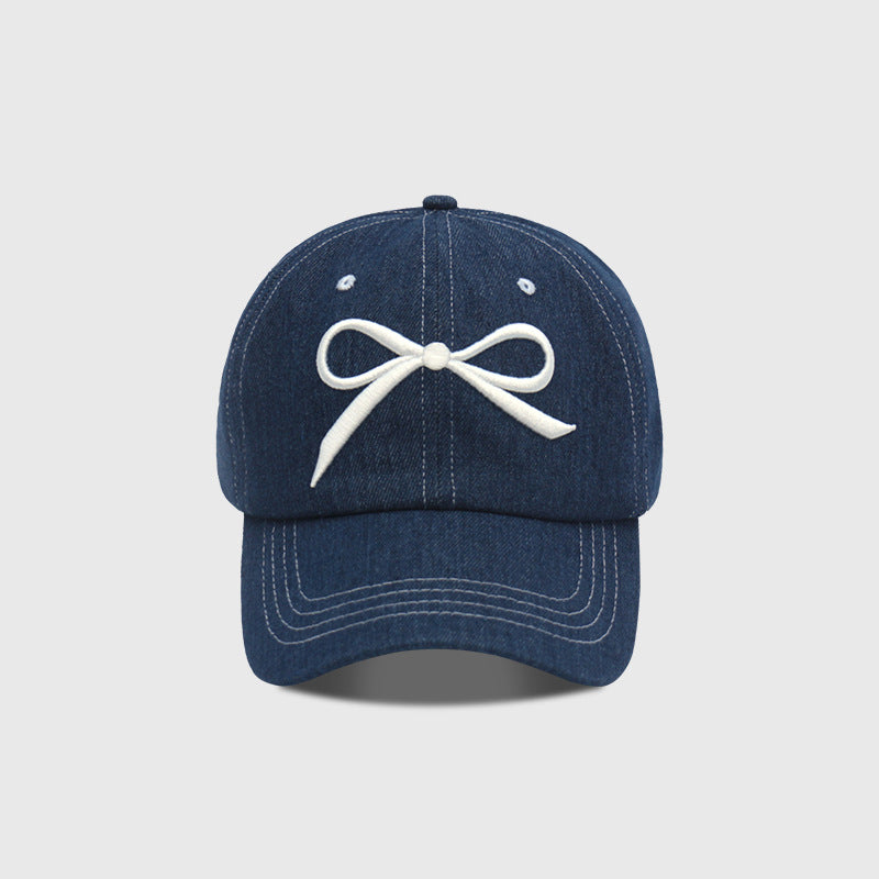 Le cap de baseball souple de la Dame est adapté pour O