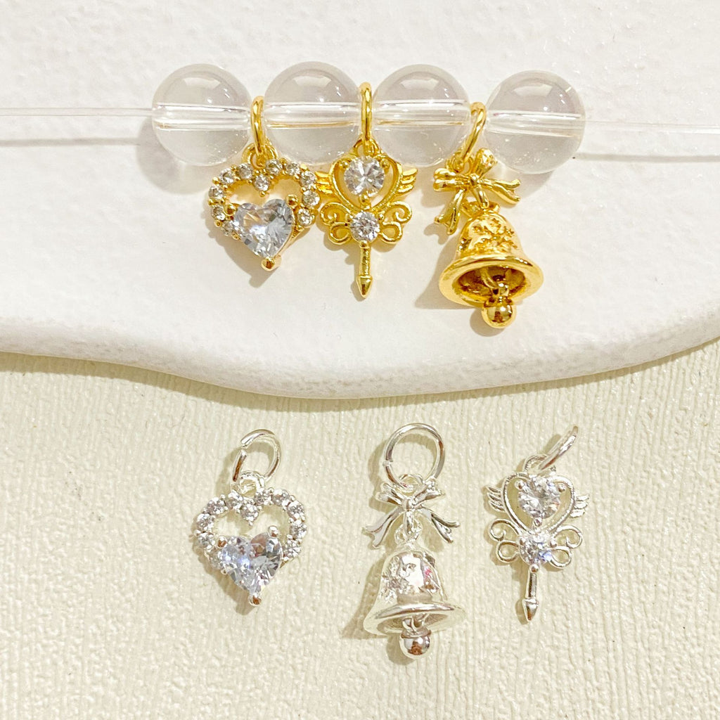 Protégeant les couleurs 14K Gold Inlaid Zircon coeur Bow de Noël et pendentif Bell