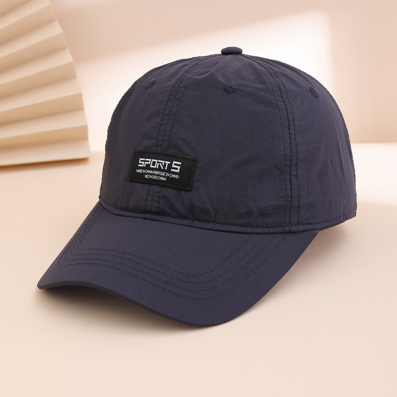Version coréenne d'une simple lettre brodée de couleur solide Séchage rapide Casquette de baseball avec A