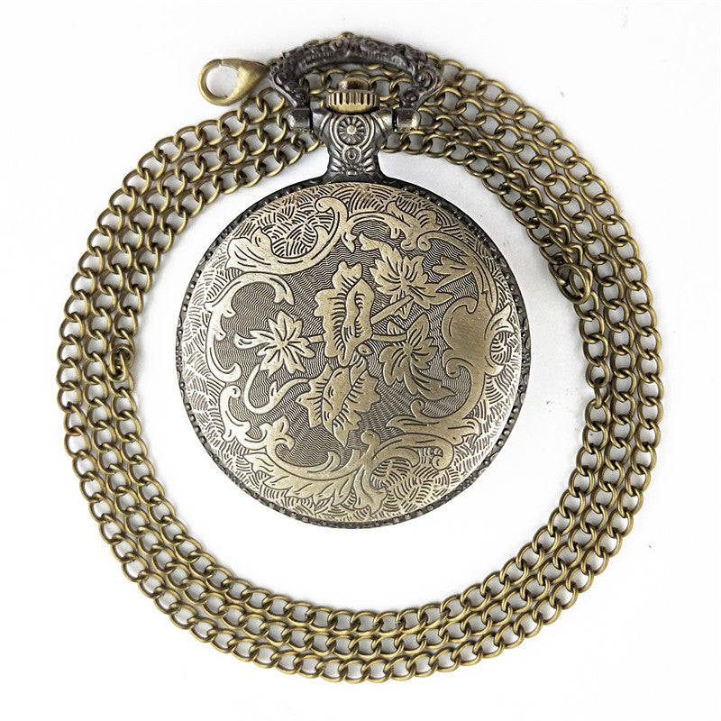 Vieille montre de poche fléchée aux gros oiseaux
