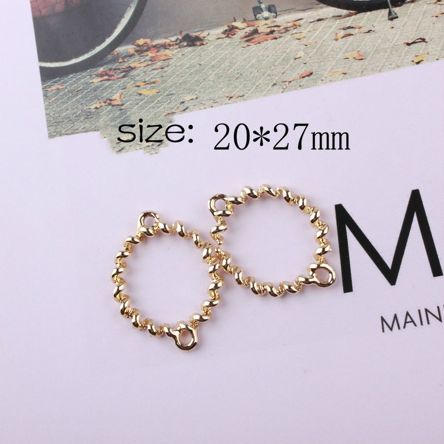 Double pendentif ovale en forme de torsion suspendue
