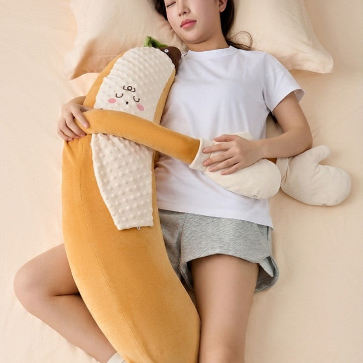 Oreiller King Banana pour jambes en train de dormir