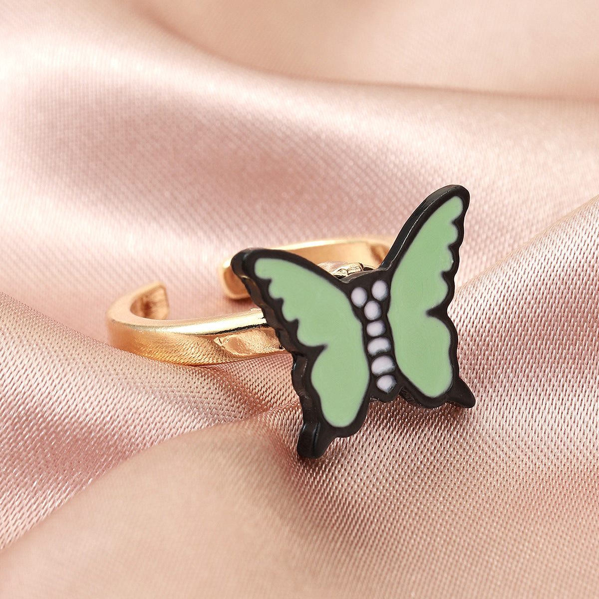 La mode La même douce bague tournante papillon
