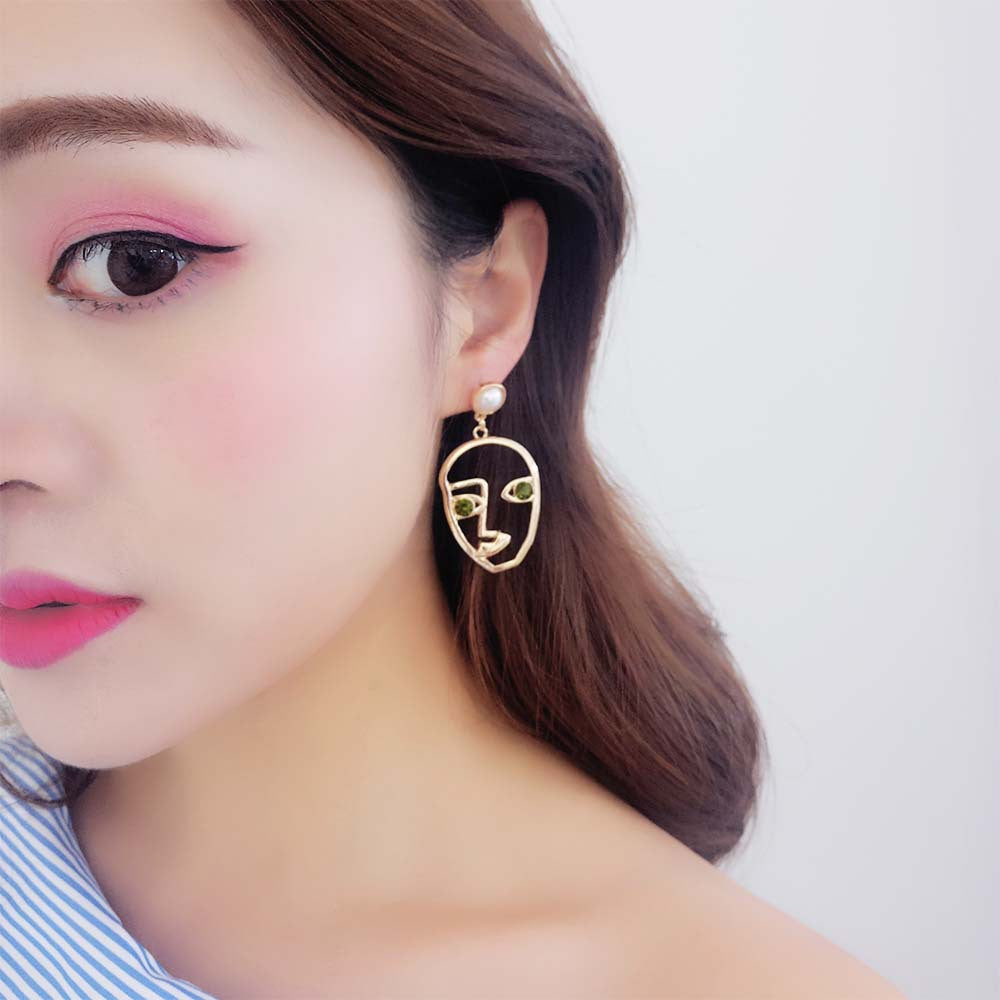 Boucles d'oreilles en perles de la personnalité du visage coréen