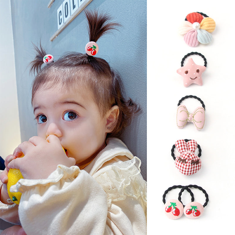 La bande de caoutchouc de Huang Xiaoniu Baby ne lui fait pas mal aux cheveux