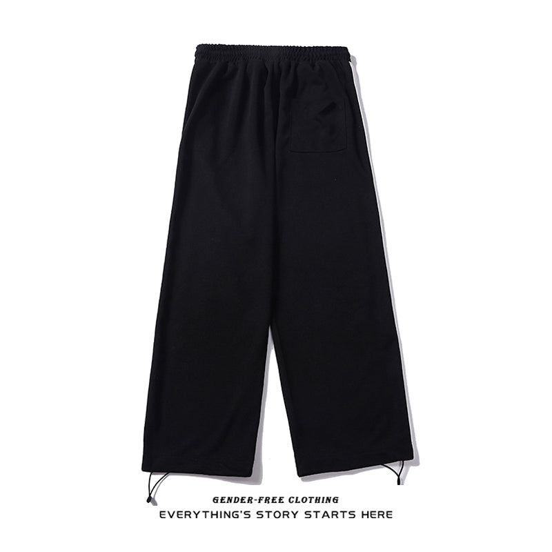 Pantalon imprimé avec pantalons à cordes pour hommes et femmes
