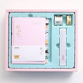 Boîte cadeau Peekaboo Ledger main