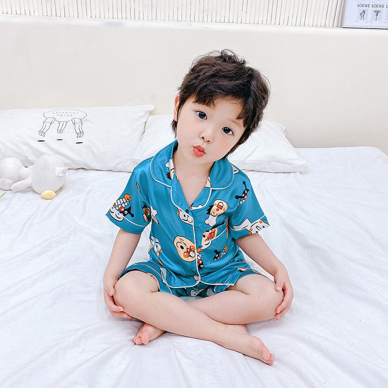 Jeu de pyjamas pour enfants Caricature en soie imprimée Service à la maison