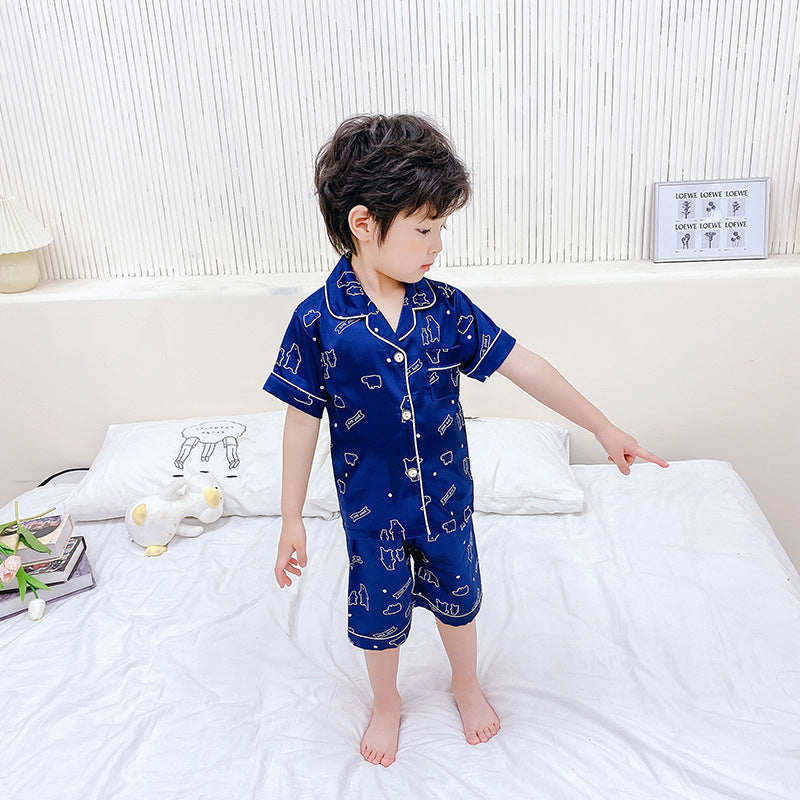 Jeu de pyjamas pour enfants Caricature en soie imprimée Service à la maison