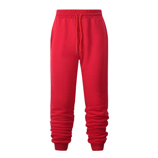 Sweatpants de fitness de course Casual Loose Chaud Sweat-absorbant Pantalons de pieds