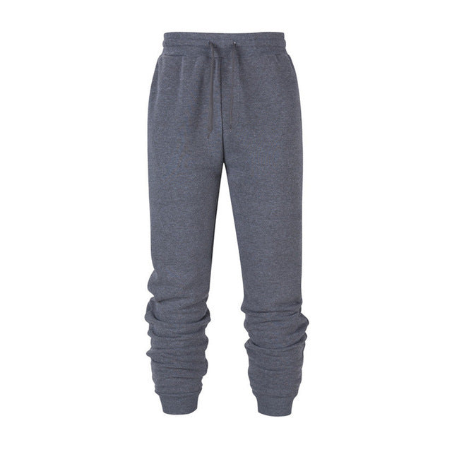 Sweatpants de fitness de course Casual Loose Chaud Sweat-absorbant Pantalons de pieds