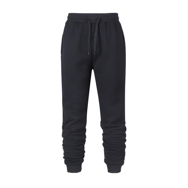 Sweatpants de fitness de course Casual Loose Chaud Sweat-absorbant Pantalons de pieds