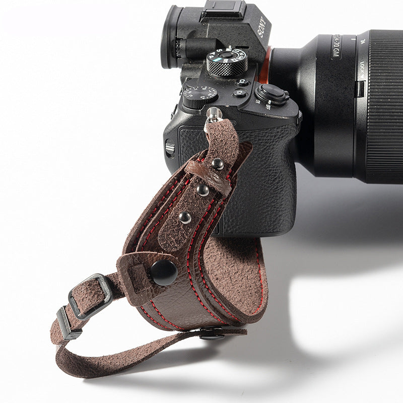Bracelet en cuir de caméra