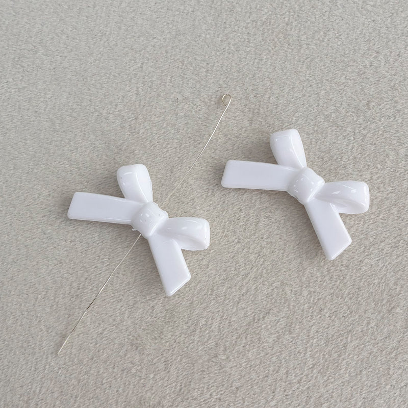 Perles d'espacement en forme de Bowknot acrylique
