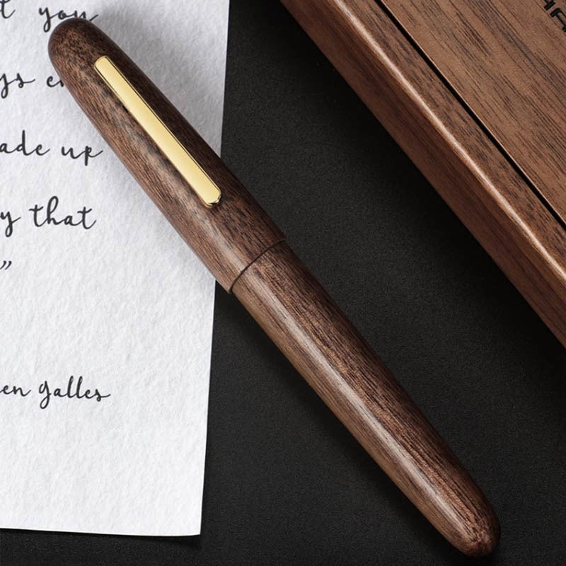 Capuchon rotatif en bois d'un stylo hommes et femmes d'affaires Calligraphie pratique