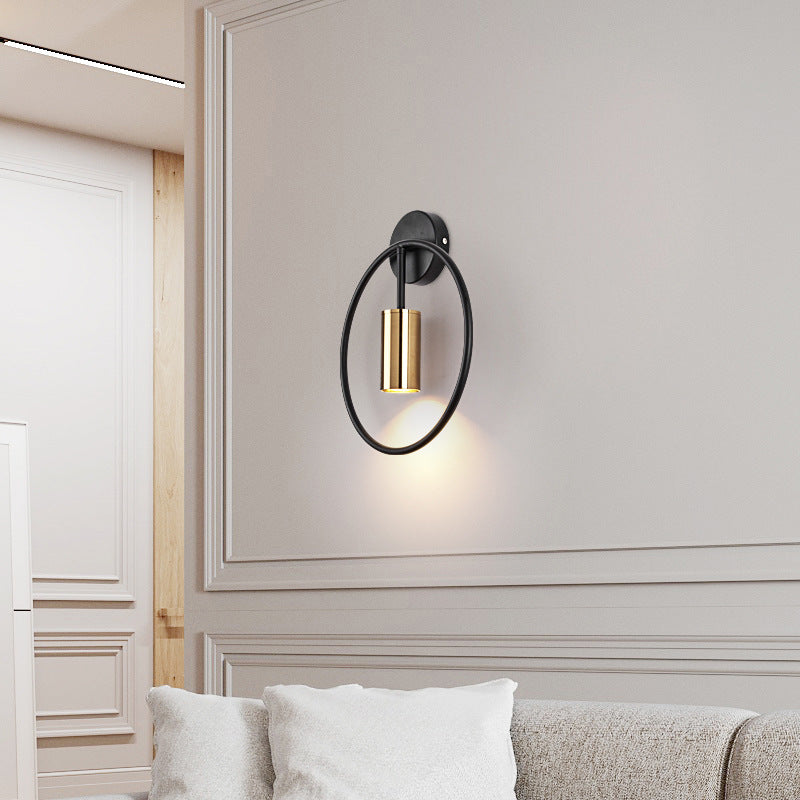 Lampe murale ronde dorée