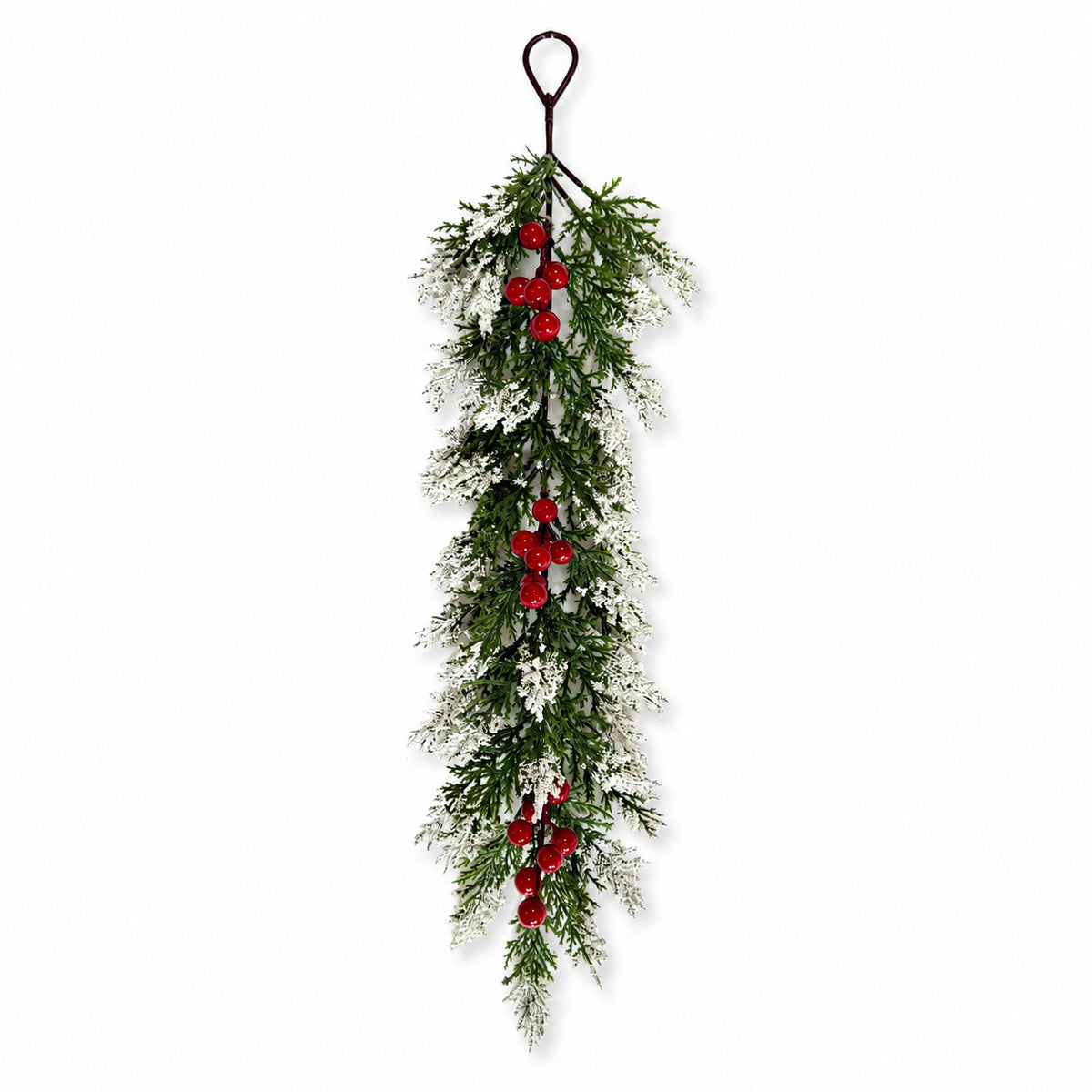 Pine de tour de neige artificielle de Noël avec des vignes de baies rouges