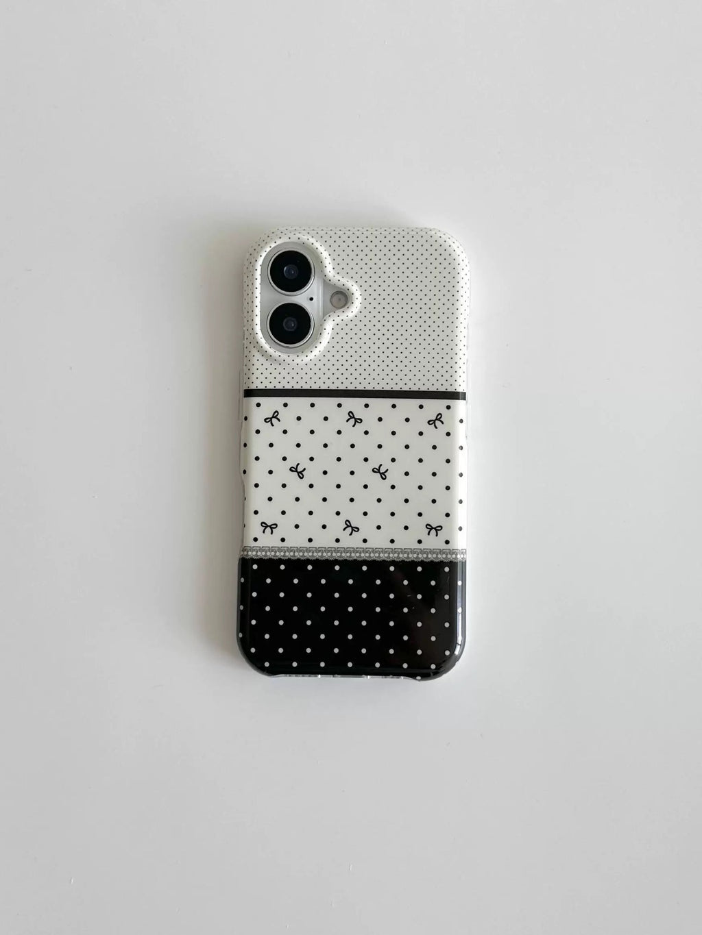 Noir et blanc Polka Dot pointant Stereo Bow cas téléphone