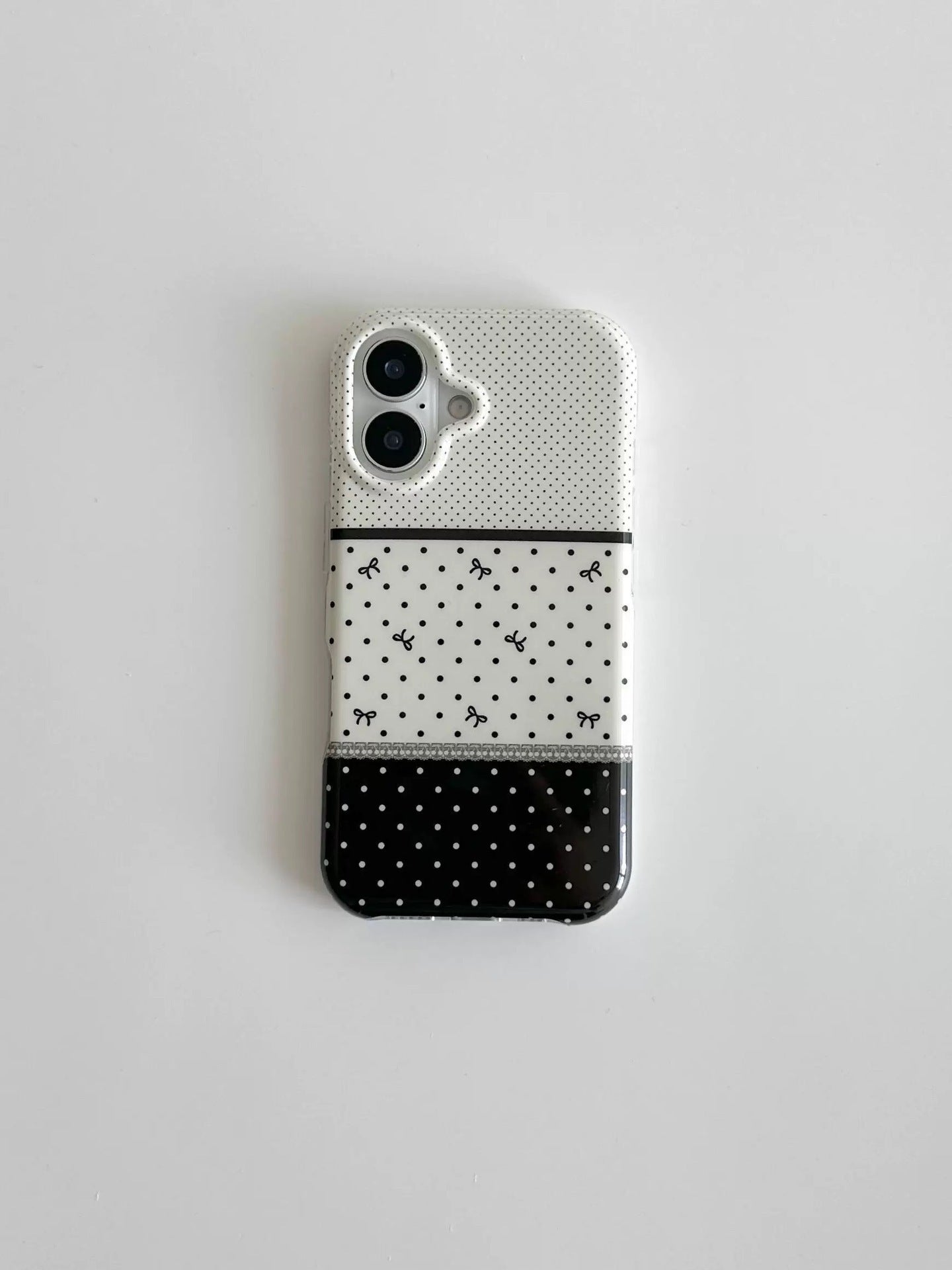 Noir et blanc Polka Dot pointant Stereo Bow cas téléphone