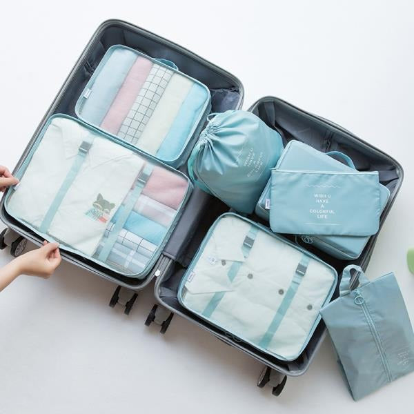 Ensemble d'organisateurs de voyage de sept pièces pliable et portable de grande capacité
