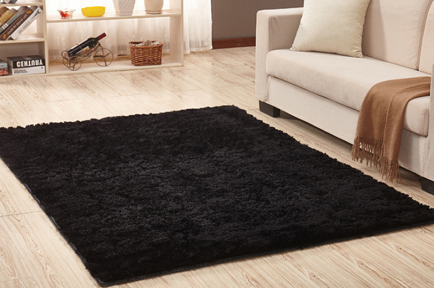 Salle de séjour table basse chambre lit côté lit non-dérapant peluche tapis