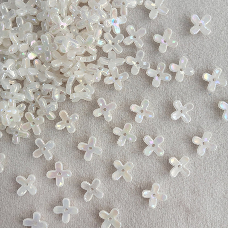 Perles de fleurs en acrylique avec paillettes dorées